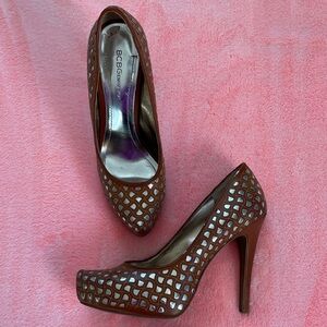 BCBG Brown & Silver Cutout Heels
So very Appealing
Very stylish Jeans or a Dress
